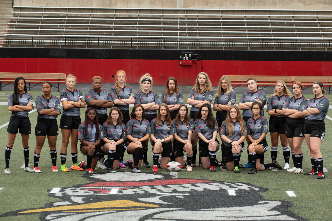The YSU Women posing for a group picture in their game uniforms.